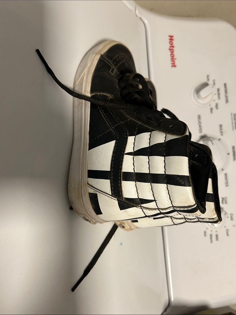 Vans Black and White High-Top Skate Shoes